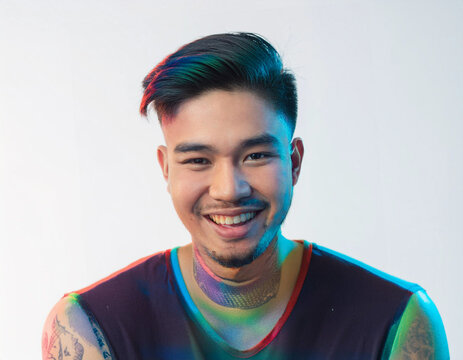 Vibrant Glitch Art of Tattooed Man Giggling in Studio with High-Contrast Effects