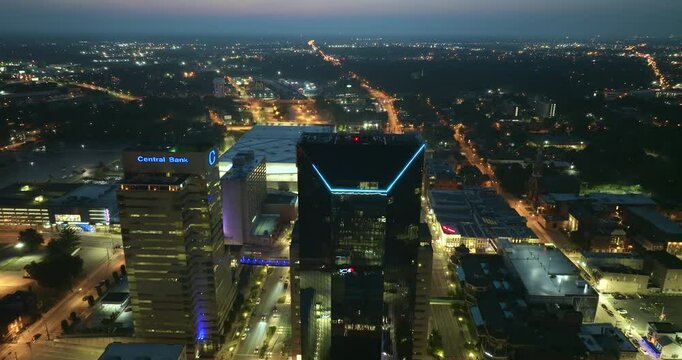 Urban landscape of downtown district of Lexington in Kentucky state, USA. American city skyline with high commercial buildings at night