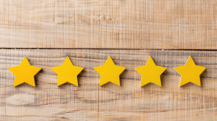 Five vibrant yellow stars arranged on a rustic wooden background, symbolizing quality and excellence in service.