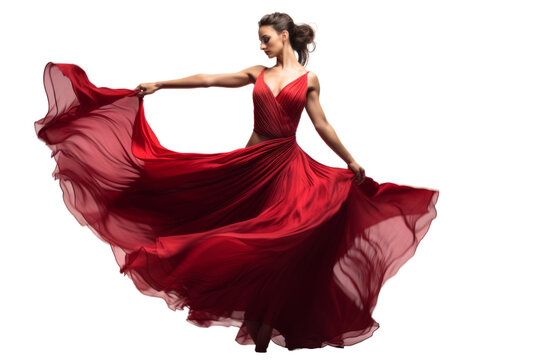 Beautiful female dancer in a glamorous gown executing a graceful move, isolated on white background