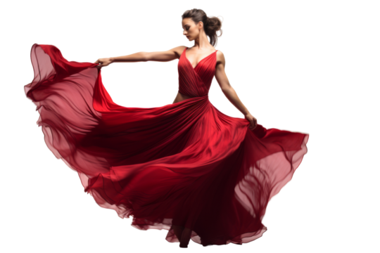 Beautiful female dancer in a glamorous gown executing a graceful move, isolated on white background