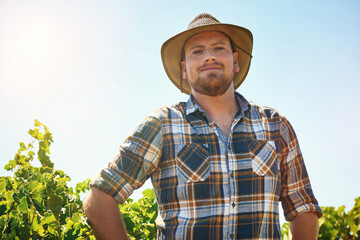 Farmer, portrait and man with smile at vineyard for sustainable, production and agriculture....