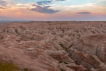 Vast and Rugged Badlands Sunrise Over the Eroded Rock Formations in Badlands National Park South Dakota