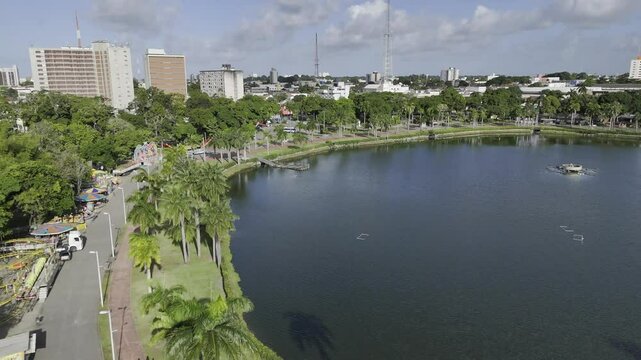 Drone flies up and away from Parque da Lagoa - Solon de Lucena in the heart of Joao Pessoa, Brazil