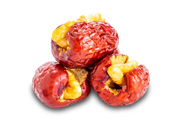 Delicious dried chinese jujube stuffed with crunchy walnut isolated on white background with clipping path.