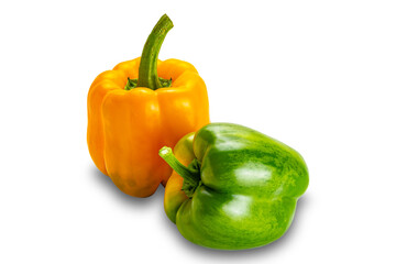 Closeup of fresh yellow and green bell pepper, paprika isolated on white background with clipping path.