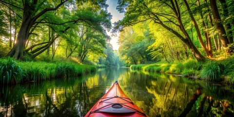 Kayak navigating through lush greenery on a serene river during a summer adventure, kayak, navigating, lush, greenery