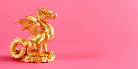 Fototapeta premium Golden Dragon Figurine on Pink Background featuring intricate details and a vibrant design.