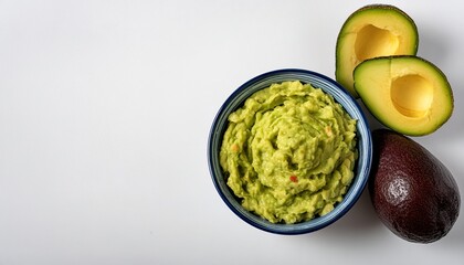 Obraz premium Guacamole or Guac is an avocado based dip, spread, or salad first developed in Mexico. made from avocado aka alligator pear - Persea americana - isolated on white background