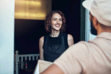 Business delivery, woman and package at front door for online shopping order, parcel distribution...