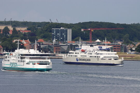 Ferry 'Aurora' (ForSea Ferries) and 'Tycho Brahe' (Oresundslinjen Ferries) crossing on Helsing&oslash;r, Denmark to Helsingborg, Sweden ferry route - June 2024
