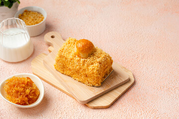 Nastar Cake is vanilla sponge based with crumbs, layered by pineapple jam and cheese cream. Topping with nastar cookies crumbs