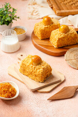 Nastar Cake is vanilla sponge based with crumbs, layered by pineapple jam and cheese cream. Topping with nastar cookies crumbs