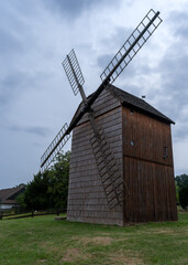 Tesany, Czech Republic, Zlin Region – 07.20.2024: Wooden windmill, Technical monument - front view