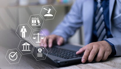 Businessman touching law icons on virtual screen for business legal advice, Labor law, Lawyer, Attorney at law, Legal advice business concept.