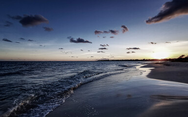 Awesome sunset at tropical Caribbean beach Playa del Carmen Mexico.