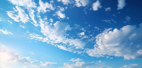 Serene Blue Sky with Fluffy White Clouds Against a Clear Sunny Background, Minimalist Landscape Painting Style, Perfect for Creative Projects and Wallpaper