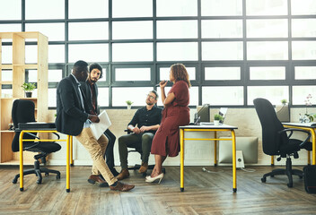 Teamwork, discussion and group in office, talking and diversity in business, corporate and brainstorming. Ideas, men and woman in meeting, paperwork and communication for project for journalist