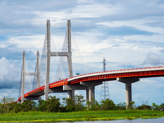 Iquitos, Peru - Apr, 2022: New bridge over the river Nanay - tributary of the Amazon in the city of Iquitos. Amazonia. Latin America.