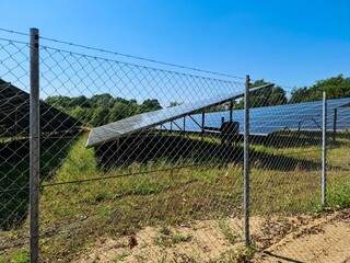 Generating clean energy with solar modules in a big park in northern Europe