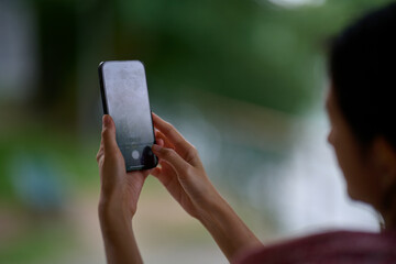 Mobile phone in female hands. 