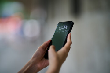 Mobile phone in female hands. 