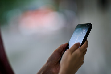 Mobile phone in female hands. 