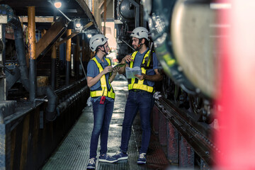 Engineer checking construction process railway and checking work on railroad station . Railway...