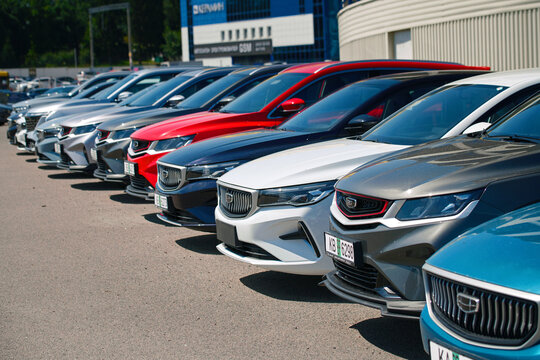 Minsk, Belarus. Jul 17, 2024. New chinese cars in row parked outdoor at the dealership yard. Brand new Geely and BelGee cars for sale. Chinese crossover, SUV and sedan cars. Car sale stock..