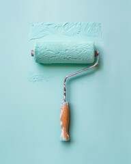 Obraz premium Blue Paint Roller Freshly Painted Wall