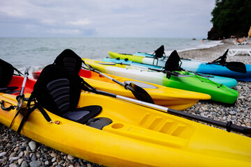 Kayaks and SUP boards on the sea. Extreme sport. Leisure. High quality photo