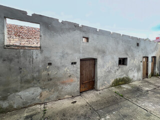 Demolition of old farm buildings among the remaining buildings