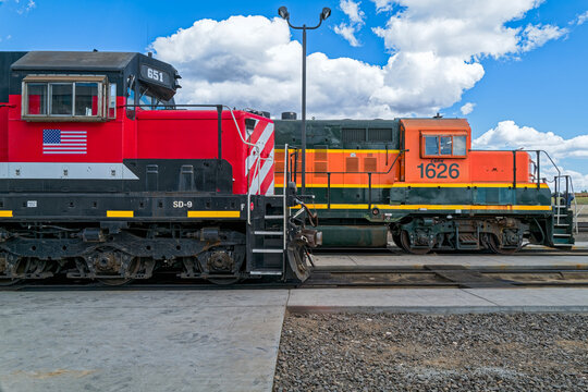 Warden, Washington, USA - May 18, 2024: Locomotives 651 and 1626 on parallel tracks at the Columbia Basin Railroad railyard