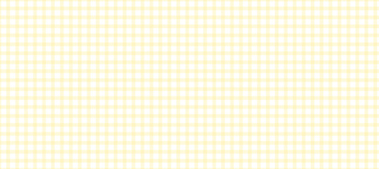 Yellow and white plaid fabric background	