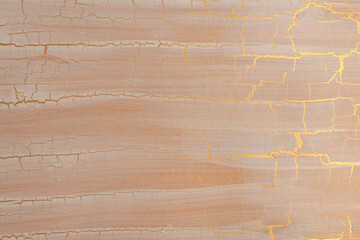 Craquelure scratch texture painting crumpled wall background. Gold, bronze, beige color.