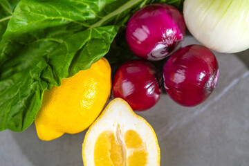 Fresh vegetables and lemon offer a colorful and healthy culinary inspiration from garden to plate