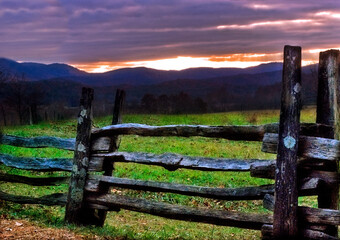 Cades Cove sunset with split rail fence in Great Smoky Mountains National Park in Tennessee