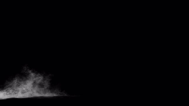 Steam, mist or fog blowing accross the ground and low to the ground, alpha channel for transparent background, 4k 24p