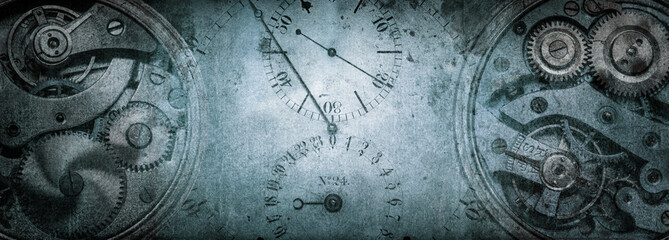 The dials of the old antique classic clocks on a vintage paper background. Concept of time,...