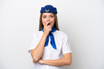 Airplane Lithuanian woman stewardess isolated on white background surprised and shocked while looking right