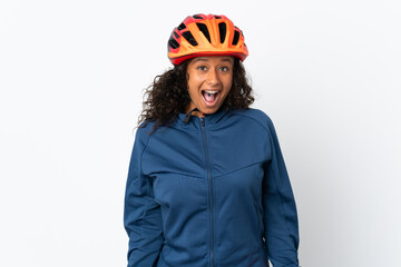 Teenager cyclist woman isolated on white background with surprise facial expression