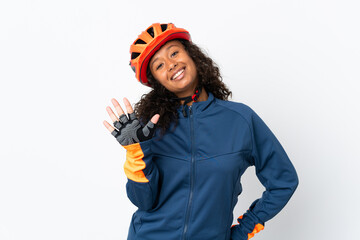 Teenager cyclist woman isolated on white background counting five with fingers