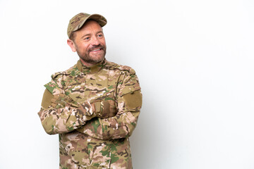 Military man isolated on white background with arms crossed and happy
