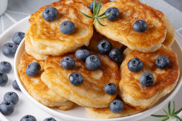 Homemade mini pancakes with blueberries