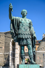 Obraz premium Bronze statue of the Roman Emperor Nerva (96 AD – 98 AD) on Via dei Fori Imperiali, Rome.