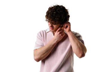 Man is dealing with ear infection caused by bacterium. Suffering from pain caused by acute otitis....