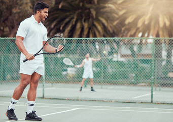 Tennis, man and celebration for winning game, competition or match outdoor at sports court....