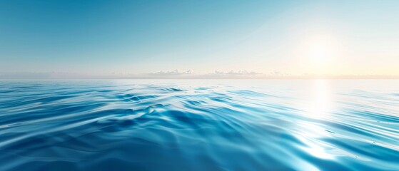 Obraz premium Tranquil ocean landscape at sunrise with calm waves and clear sky, showcasing the serene beauty of nature and water reflection.