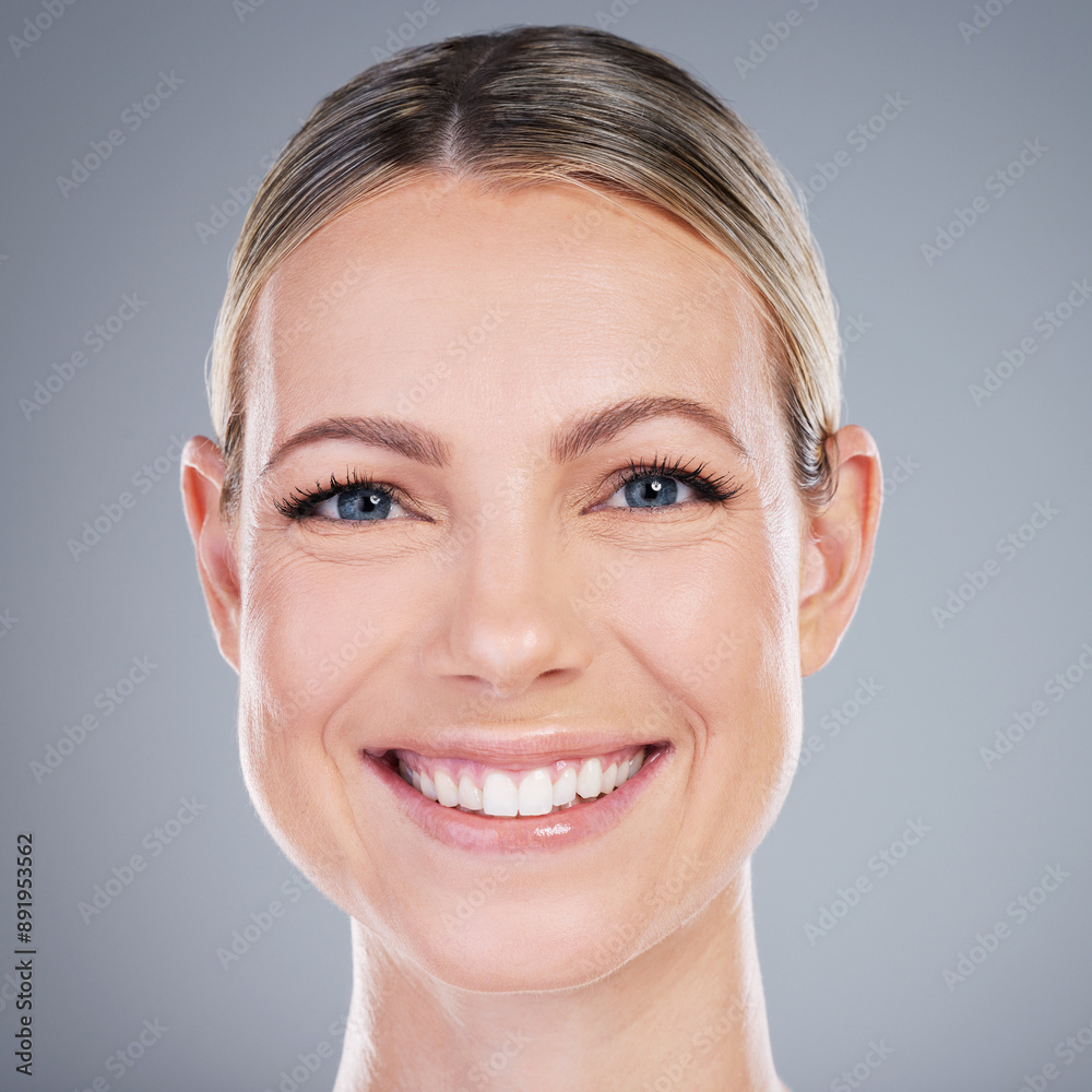 Canvas Prints Woman, face and smile in studio for skincare, beauty and luxury spa treatment on gray background. Girl, happy and confidence for healthy skin, self care and wellness with facial transformation