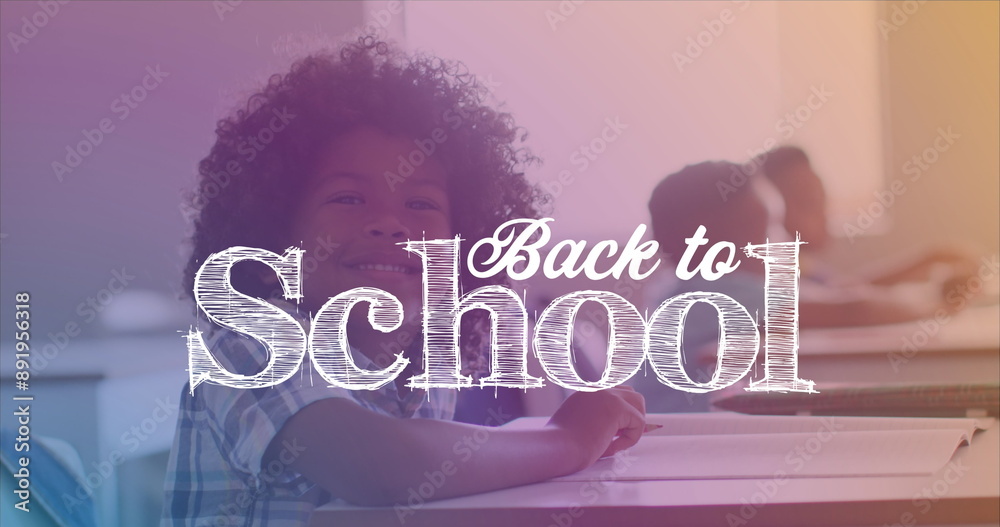 Wall mural Image of back to school over happy african american girl sitting in school desk